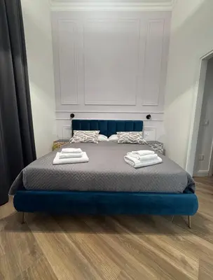 Letto o letti in una camera di La Boutique del Centro
