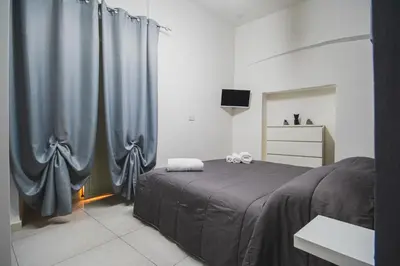 Letto o letti in una camera di Pignahome