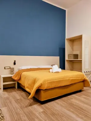 Letto o letti in una camera di Casa Maluma