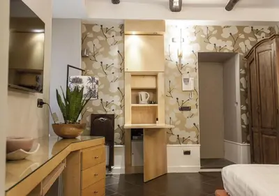 Letto o letti in una camera di Relais Santa Chiara