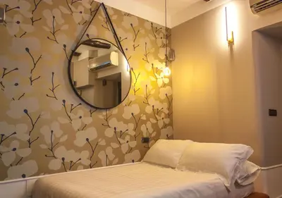 Letto o letti in una camera di Relais Santa Chiara