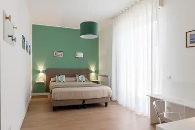 Letto o letti in una camera di Piazza Dante CASA DI GIO'