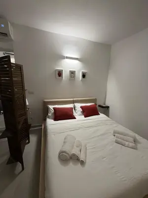 Letto o letti in una camera di Casa Sapienza