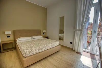 Letto o letti in una camera di B&B Filangieri