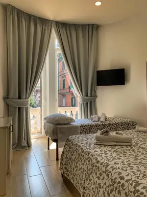 Letto o letti in una camera di B&B Filangieri