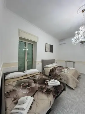 Letto o letti in una camera di Nonna Rosa Home