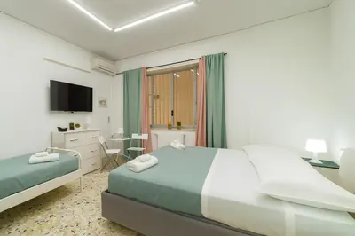 Letto o letti in una camera di NaNàpolis Stay