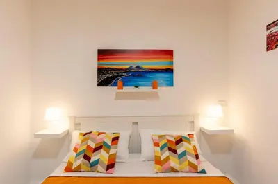 Letto o letti in una camera di Bobbò house V il giardino a santa chiara