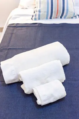 Letto o letti in una camera di Bobbò house V il giardino a santa chiara