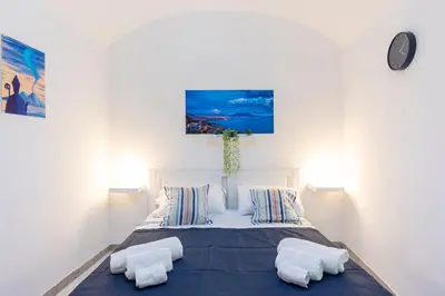 Letto o letti in una camera di Bobbò house V il giardino a santa chiara