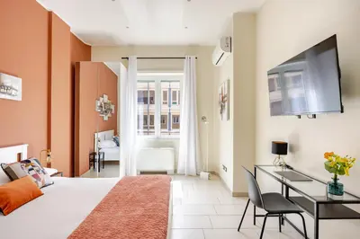 Letto o letti in una camera di Al Maschio Angioino Apartment - In the center of Naples
