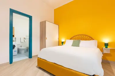 Letto o letti in una camera di Glow Napoli Retreat - Top Collection