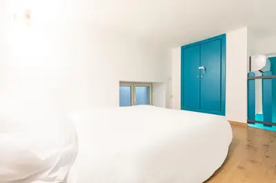 Letto o letti in una camera di Glow Napoli Retreat - Top Collection