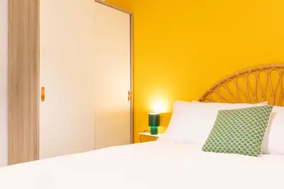 Letto o letti in una camera di Glow Napoli Retreat - Top Collection