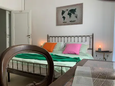 Letto o letti in una camera di Rosa e Peperoncino