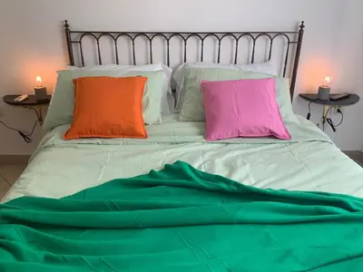 Letto o letti in una camera di Rosa e Peperoncino