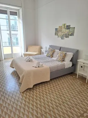 Letto o letti in una camera di Toledo Comfort Apartment in Napoli