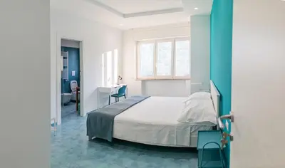 Letto o letti in una camera di Casa Nuova Marina