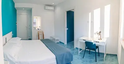 Letto o letti in una camera di Casa Nuova Marina