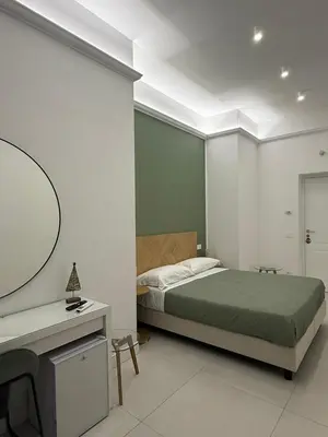 Letto o letti in una camera di Napoli Antica A Pignatelli