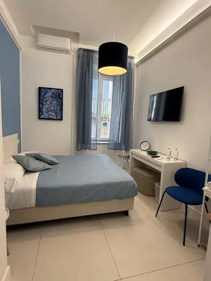 Letto o letti in una camera di Napoli Antica A Pignatelli