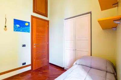 Letto o letti in una camera di Montesanto Flow Flat by Napoliapartments