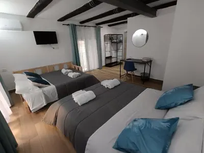 Letto o letti in una camera di casa MA guesthouse