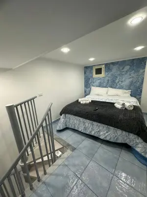 Letto o letti in una camera di Maddy House