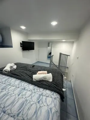 Letto o letti in una camera di Maddy House