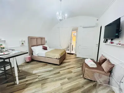 TV o dispositivi per l'intrattenimento presso Donn'Anna Naples City Center Luxury Apartment