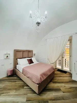 Letto o letti in una camera di Donn'Anna Naples City Center Luxury Apartment