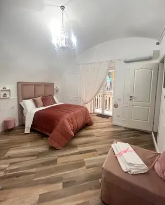 Letto o letti in una camera di Donn'Anna Naples City Center Luxury Apartment