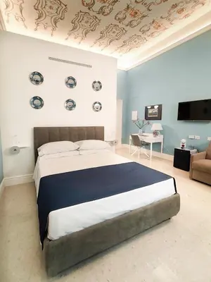 Letto o letti in una camera di Alma Regina Relais