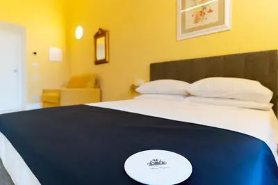 Letto o letti in una camera di Alma Regina Relais