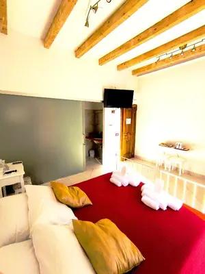 Letto o letti in una camera di I Migliori Artisti New
