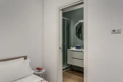 Letto o letti in una camera di Casa Anna