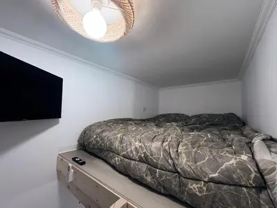 Letto o letti in una camera di ViGi Home