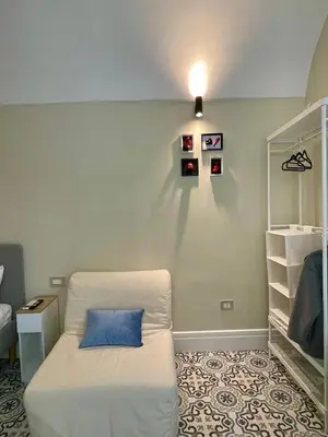 Letto o letti in una camera di Sophia Suite