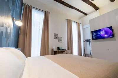 Letto o letti in una camera di Relais Borbonico Museo
