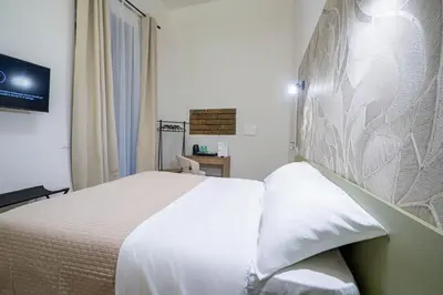Letto o letti in una camera di Relais Borbonico Museo