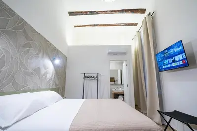 Letto o letti in una camera di Relais Borbonico Museo