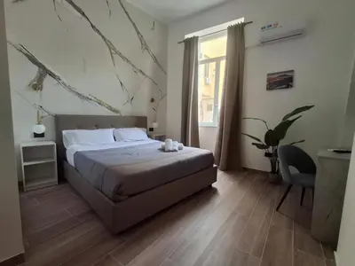 Letto o letti in una camera di Palace Ecce Hom0