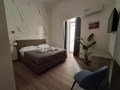 Letto o letti in una camera di Palace Ecce Hom0