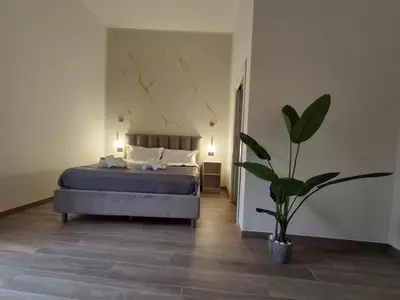 Letto o letti in una camera di Palace Ecce Hom0
