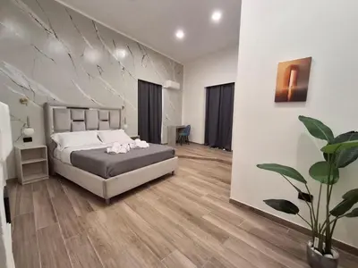 Letto o letti in una camera di Palace Ecce Hom0
