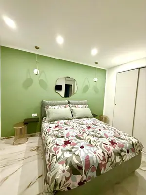 Letto o letti in una camera di DEA Suite & Garden