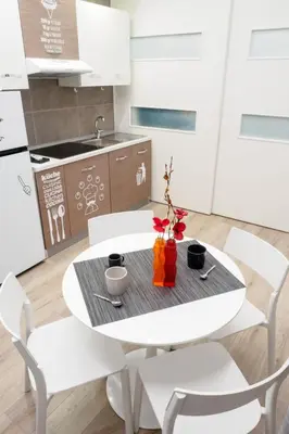 Cucina o angolo cottura di Apartment Plebiscito Home Holidays -- Im Herzen von Neapel -- nur 150 Meter von der zen by Interhome