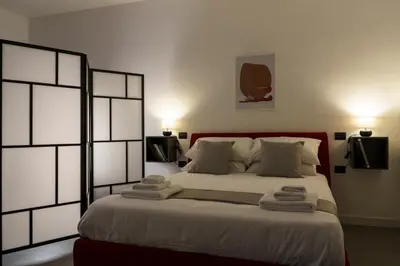 Letto o letti in una camera di Eleven Studios