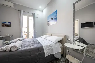 Letto o letti in una camera di Elite Portanova