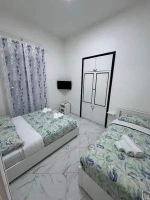 Letto o letti in una camera di Residenza Castel Capuano
